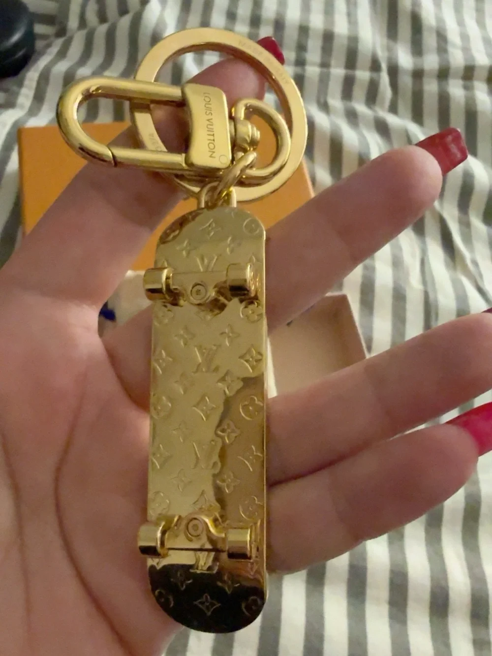Louis Vuitton Gold Textured Leather Logo & Charm/Key Holder